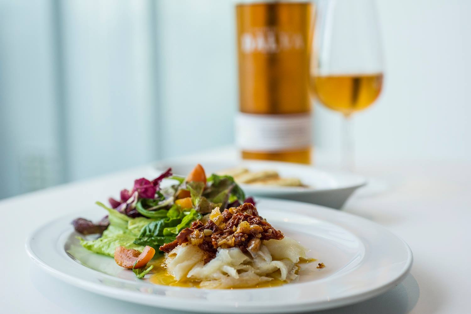 Plat de morue fumee avec vinaigrette de tomate sechee et amandes - restaurant DeCastro Gaia - Espace Porto Cruz